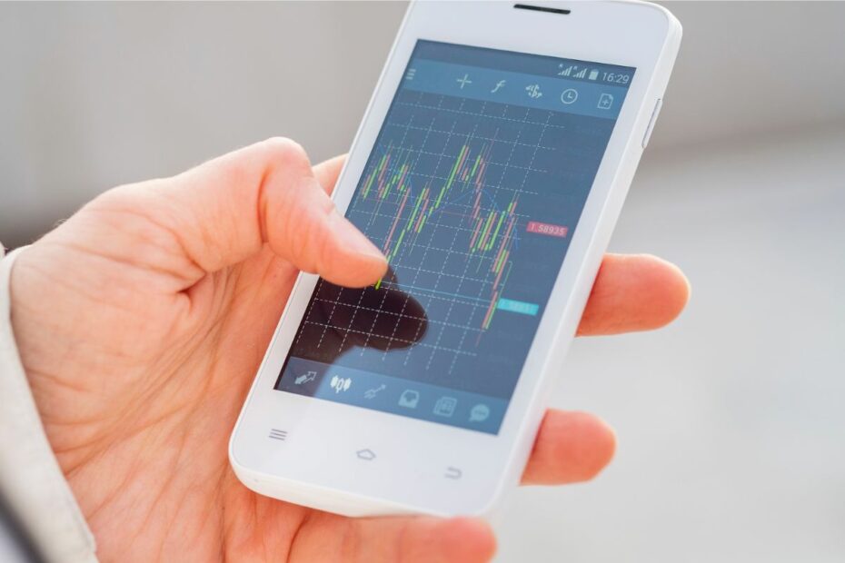 Layar smartphone yang menampilkan grafik saham.